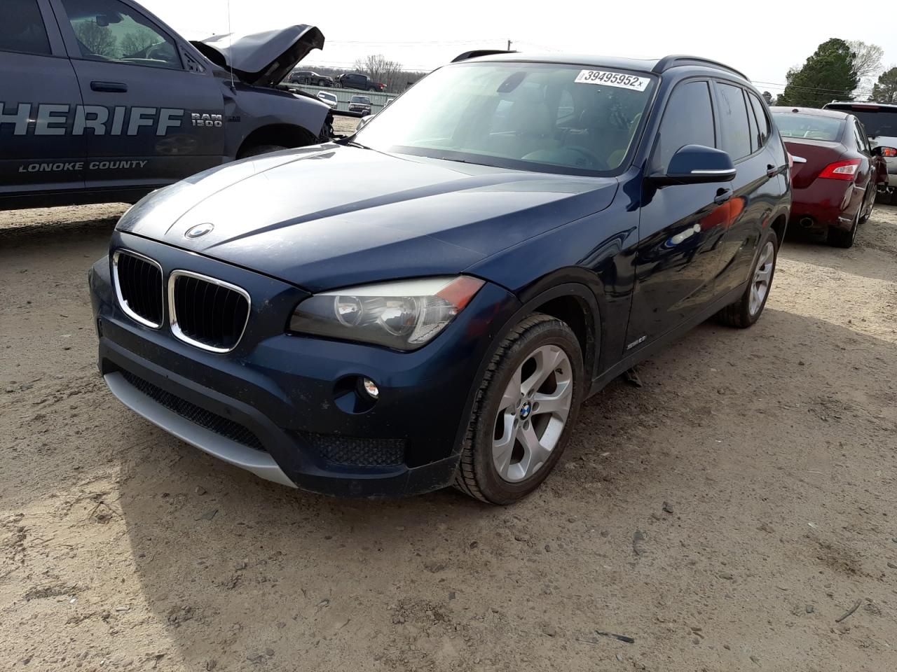 Photo 2 from auction – 2014 BMW X1 SDRIVE2 with VIN WBAVM1C55EVW53664