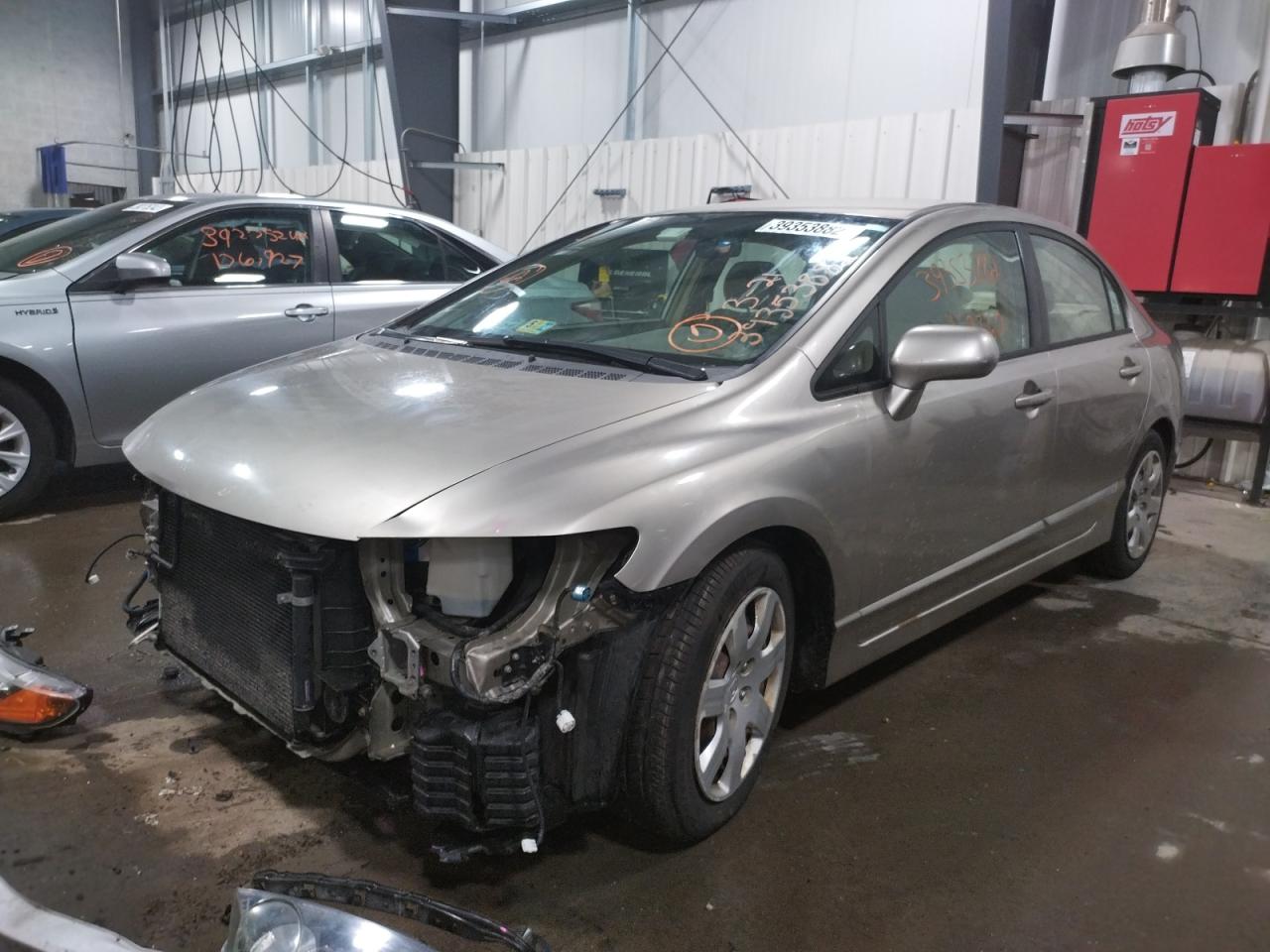 Photo 2 from auction – 2006 HONDA CIVIC LX with VIN 1HGFA15586L073577