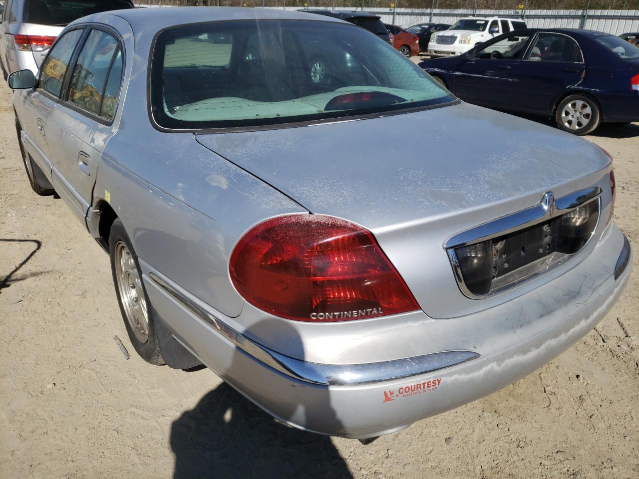 Photo 3 from auction – 1998 LINCOLN CONTINENTA with VIN 1LNFM97VXWY676871