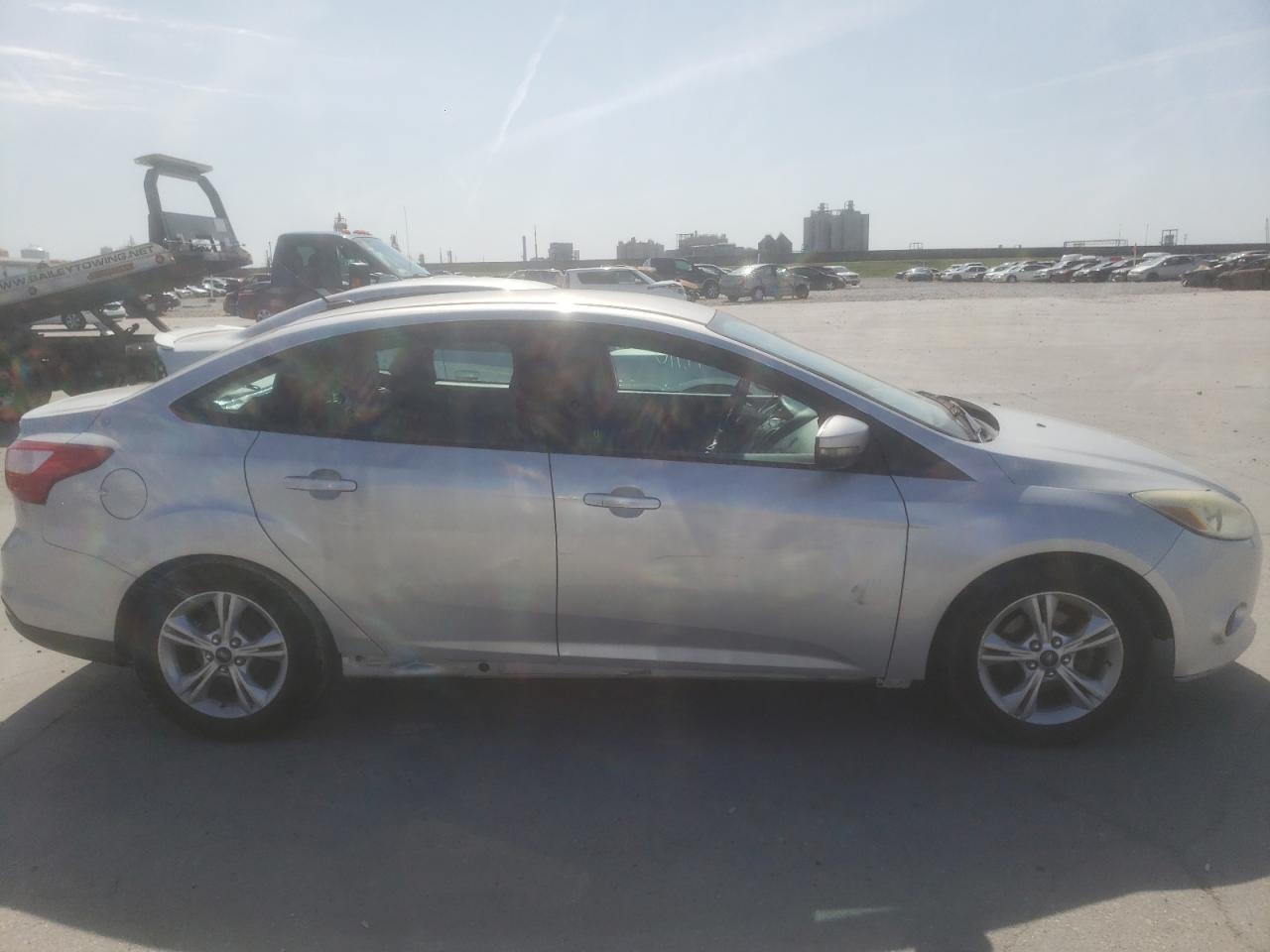Photo 9 from auction – 2014 FORD FOCUS SE with VIN 1FADP3F20EL211699