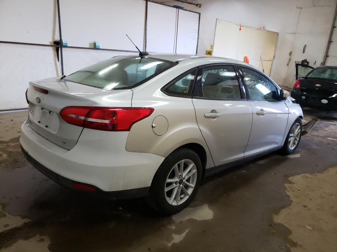 Photo 4 from auction – 2018 FORD FOCUS SE with VIN 1FADP3F27JL231829