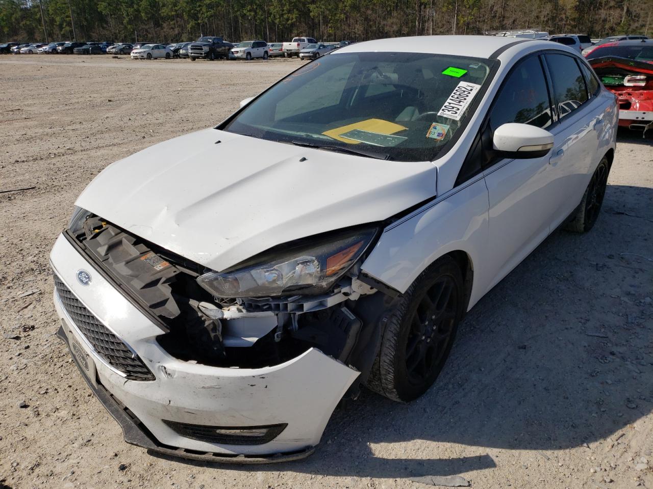 Photo 2 from auction – 2016 FORD FOCUS SE with VIN 1FADP3F28GL369260