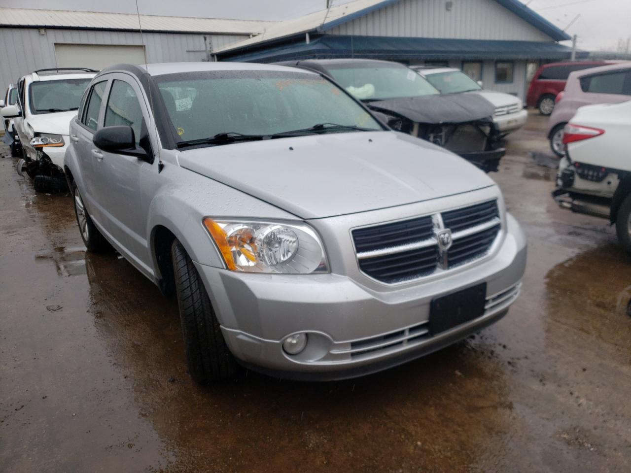 DODGE CALIBER MA 2011 with VIN 1B3CB3HA2BD256840 - Photo from auction