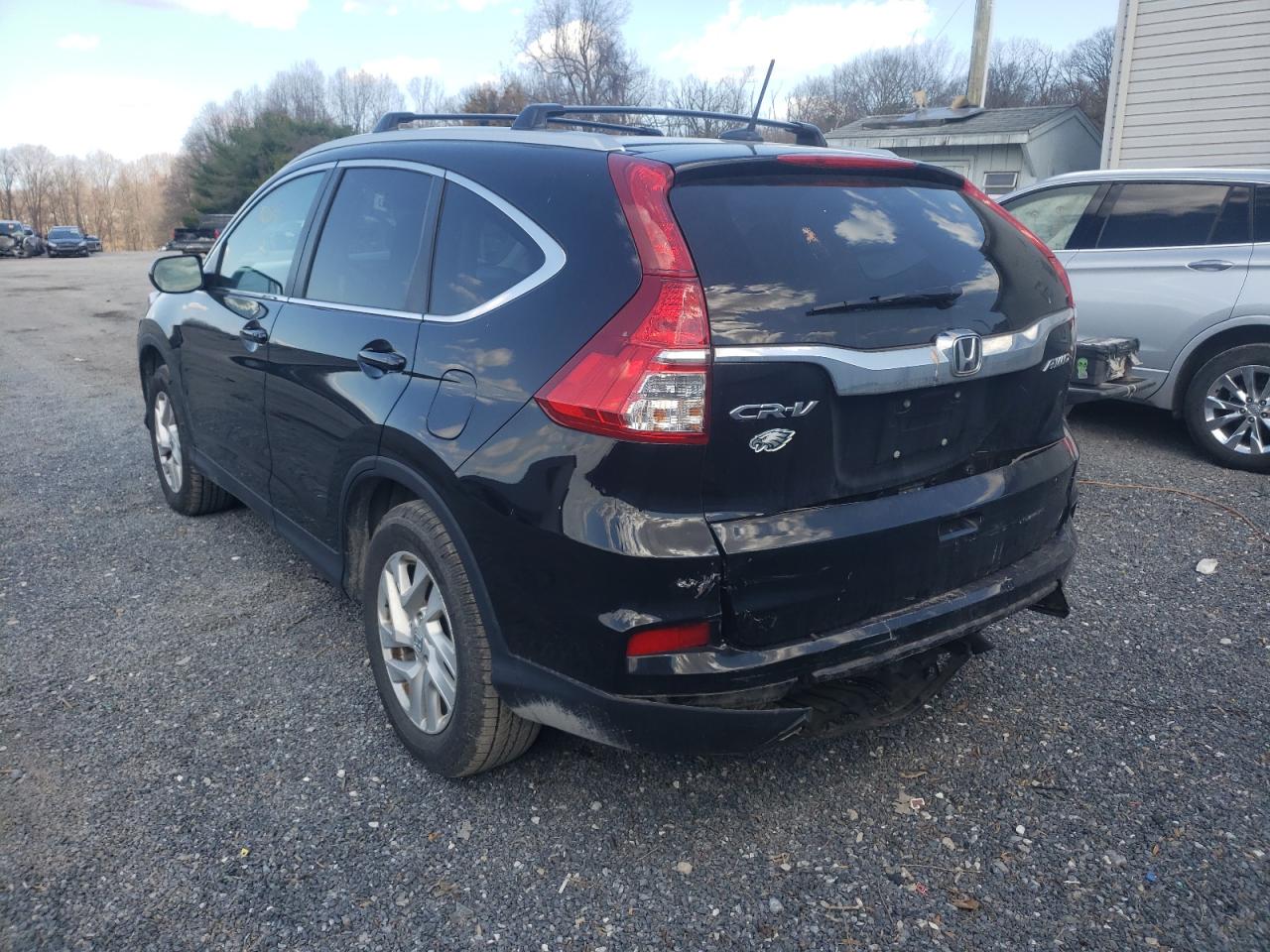 Photo 3 from auction – 2015 HONDA CR-V EXL with VIN 2HKRM4H72FH668690