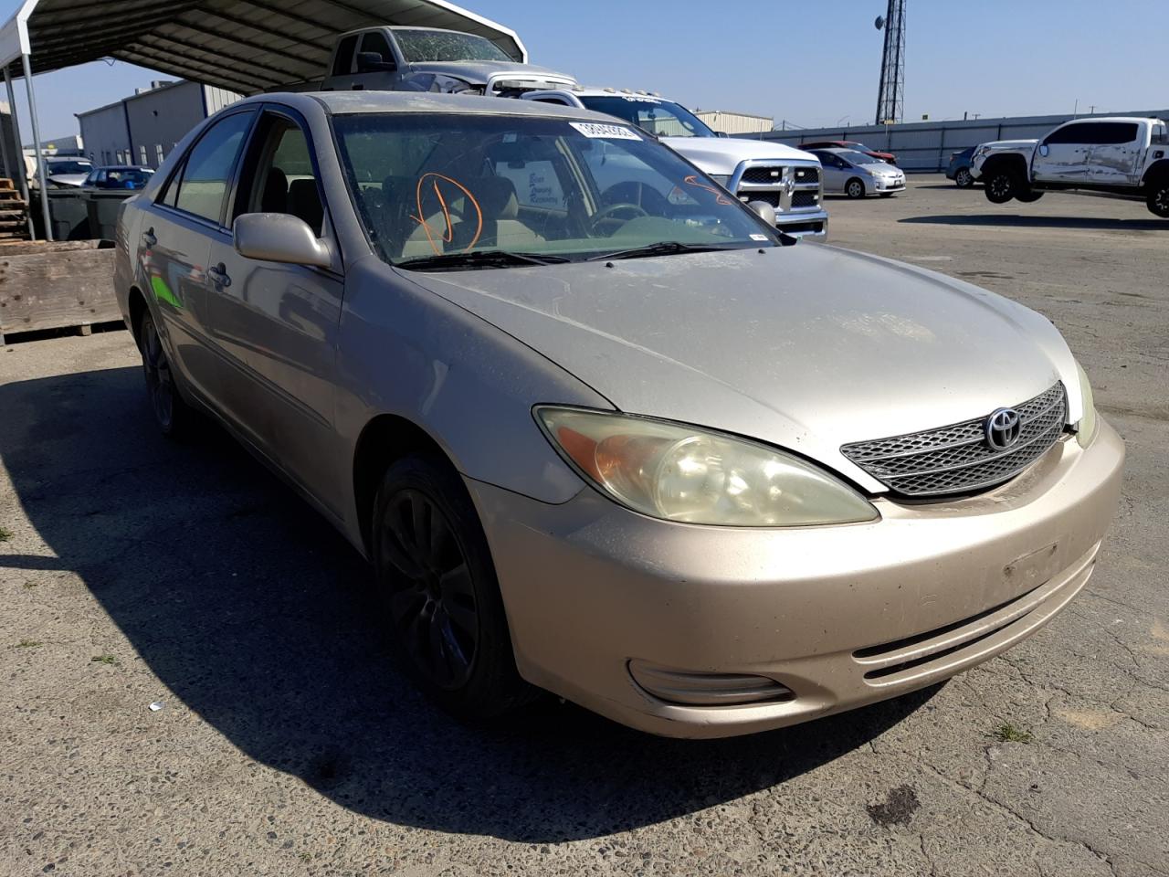 TOYOTA CAMRY LE 2004 with VIN 4T1BE32K54U377458 - Photo from auction