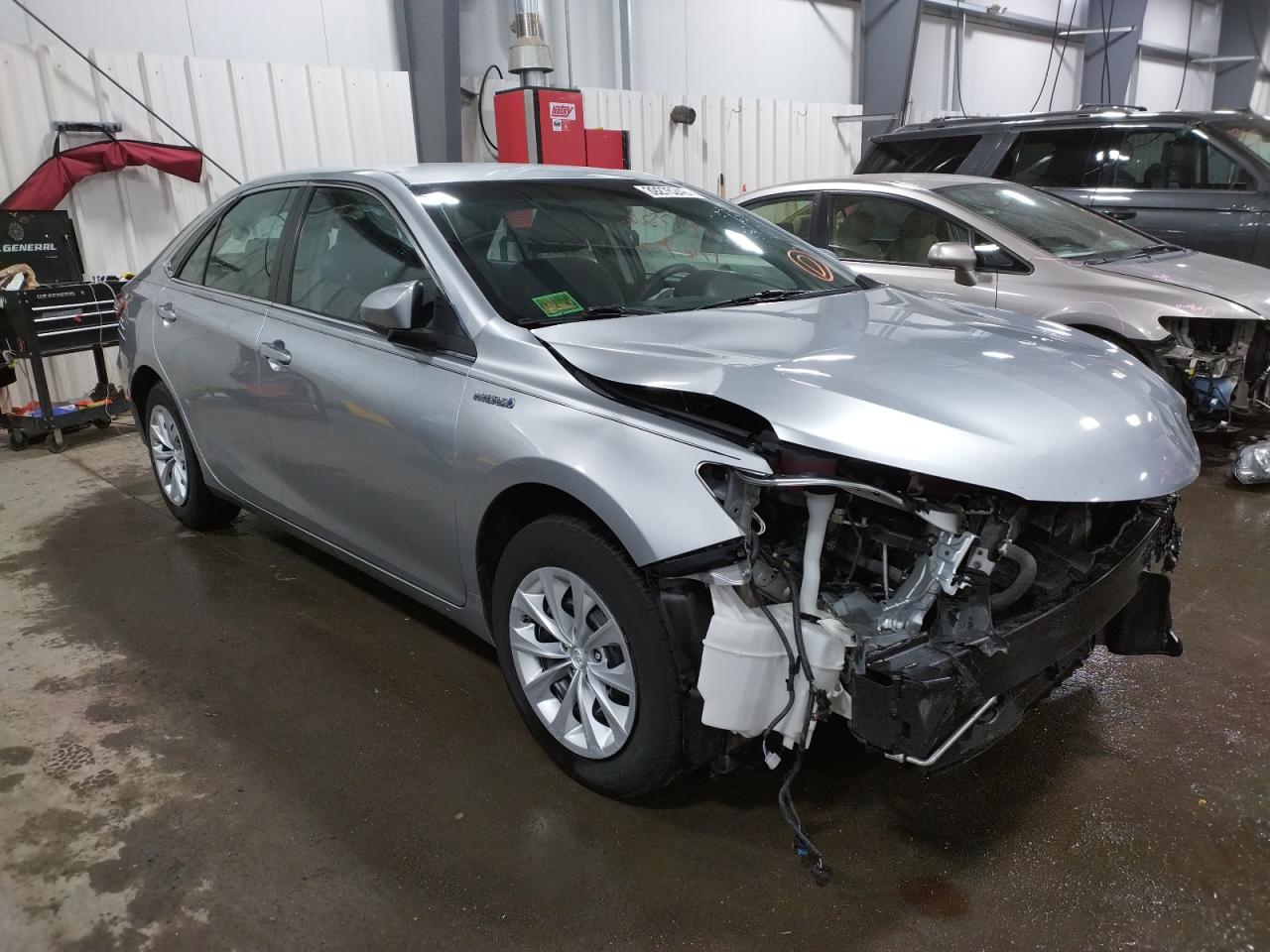 TOYOTA CAMRY HYBR 2016 with VIN 4T1BD1FK3GU192928 - Photo from auction