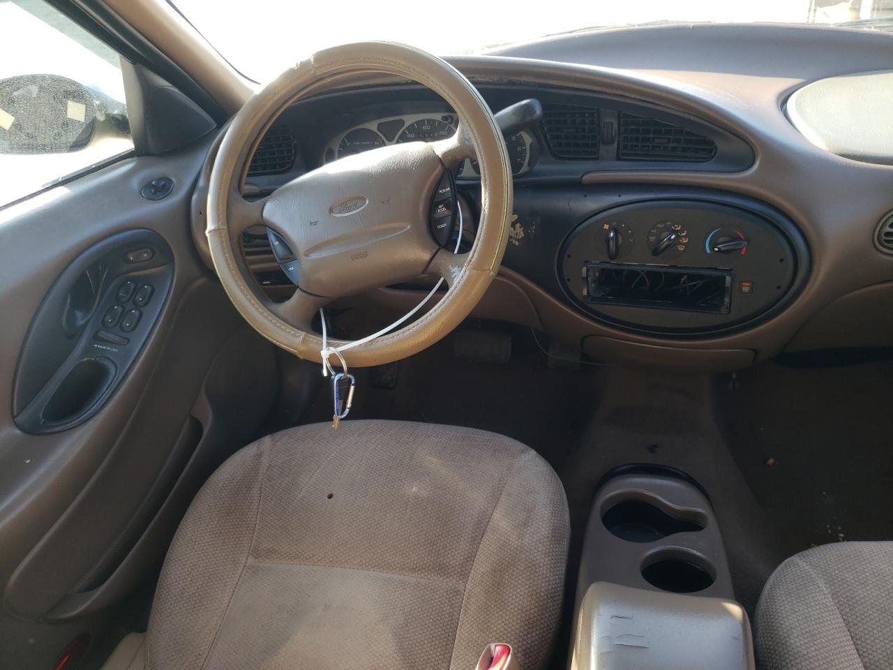 Photo 9 from auction – 1999 FORD TAURUS SE with VIN 1FAFP53S2XA302397