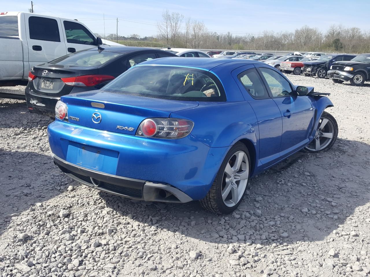 Photo 4 from auction – 2004 MAZDA RX8 with VIN JM1FE173140111504