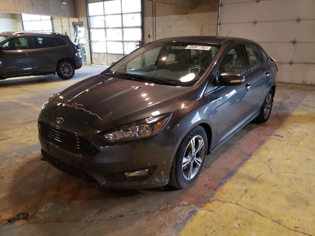 Photo 2 from auction – 2017 FORD FOCUS SE with VIN 1FADP3FEXHL310240