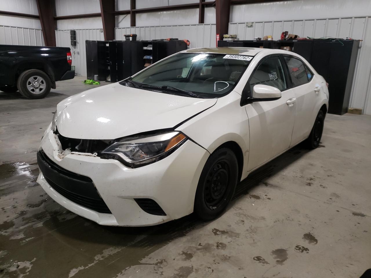 Photo 2 from auction – 2014 TOYOTA COROLLA EC with VIN 5YFBPRHE6EP038743