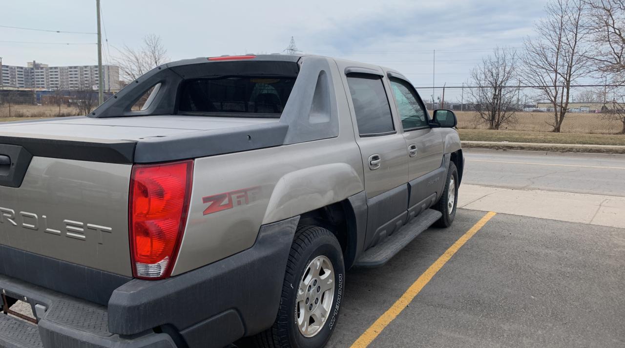 Photo 4 from auction – 2003 CHEVROLET AVALANCHE with VIN 3GNEC13T33G146909
