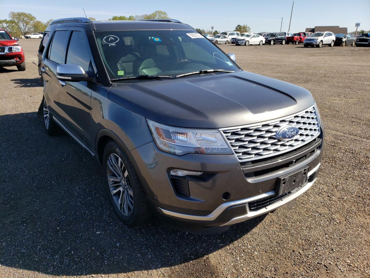 FORD EXPLORER P 2019 with VIN 1FM5K8HTXKGA59642 - Photo from auction