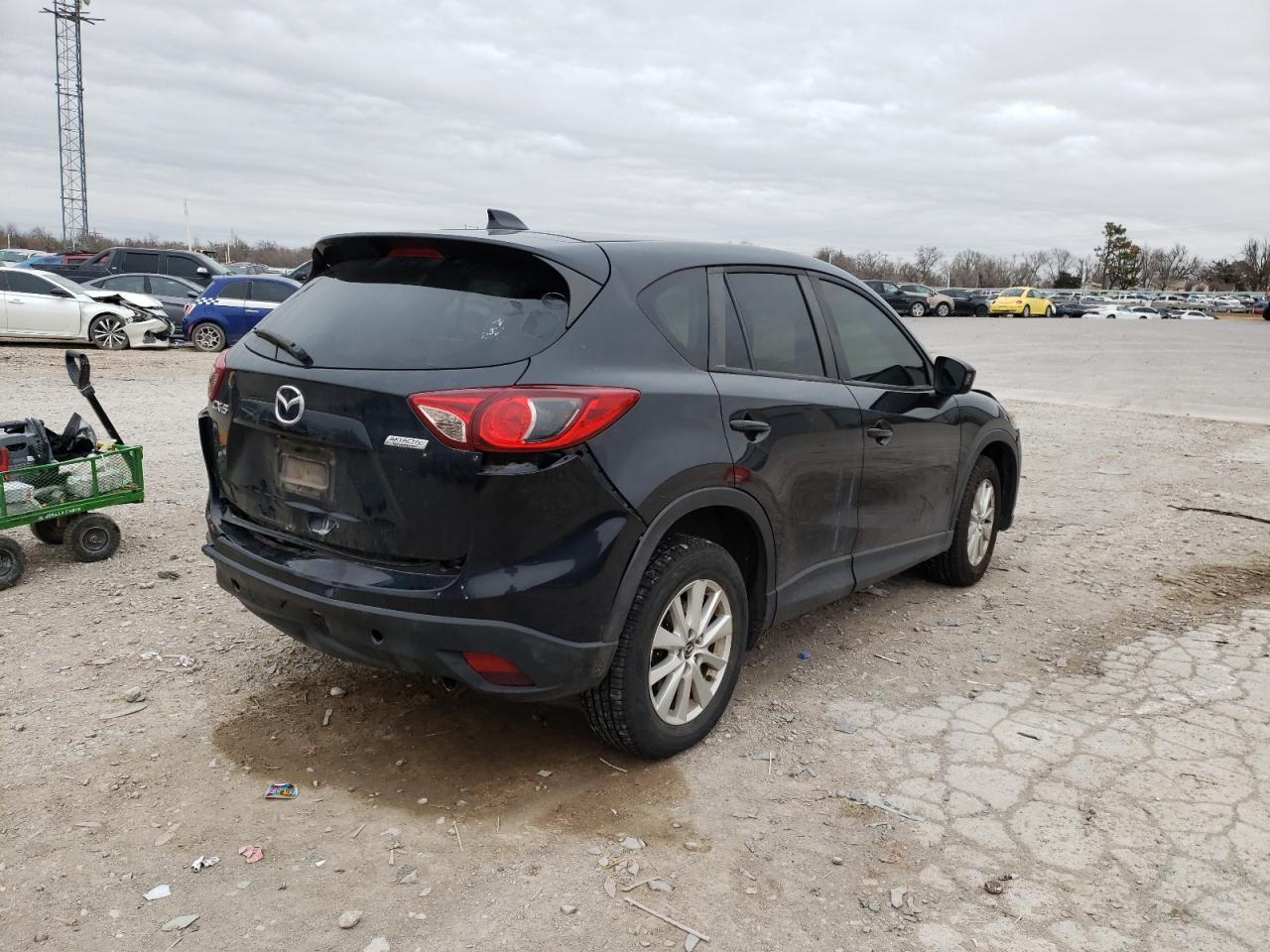 Photo 4 from auction – 2013 MAZDA CX-5 TOURI with VIN JM3KE2CE1D0141685