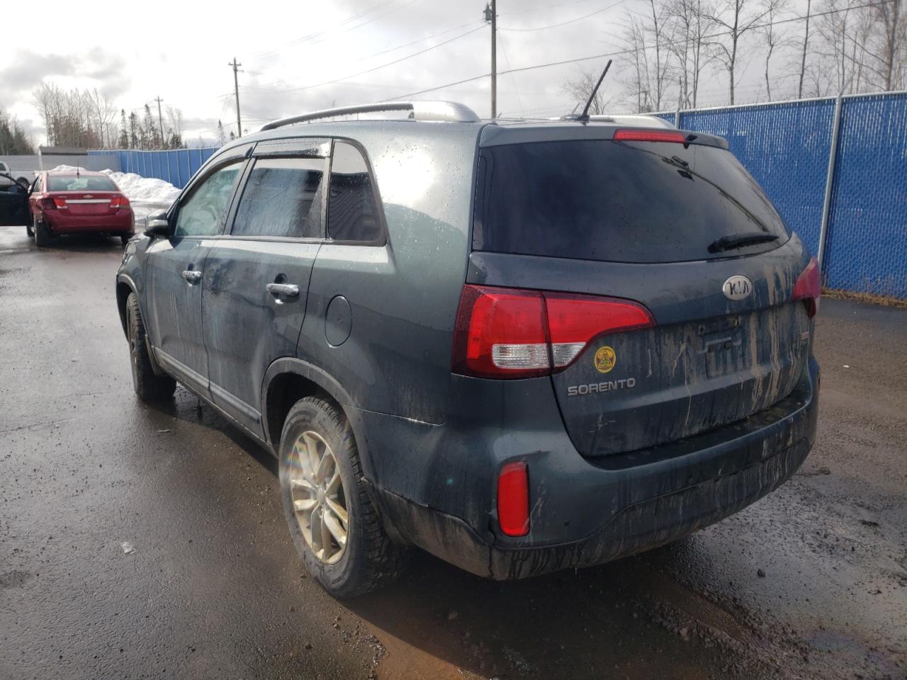 Photo 3 from auction – 2014 KIA SORENTO LX with VIN 5XYKT3A67EG523098