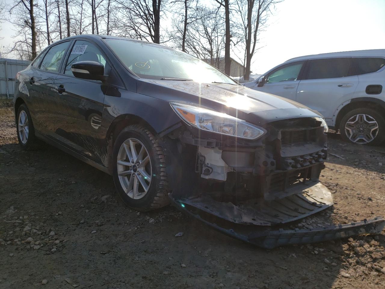 FORD FOCUS SE 2016 with VIN 1FADP3F24GL277885 - Photo from auction