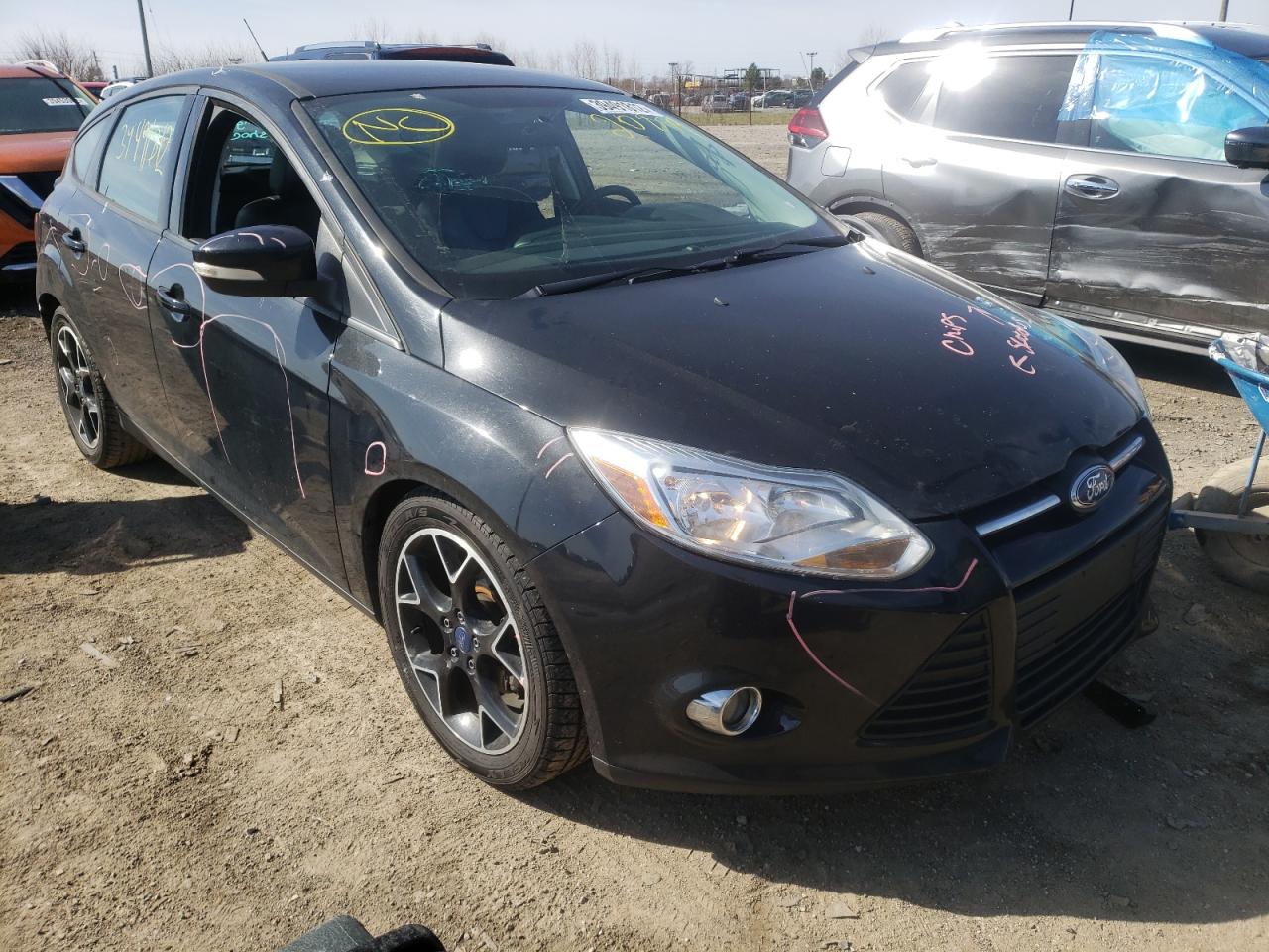FORD FOCUS SE 2014 with VIN 1FADP3K28EL204859 - Photo from auction