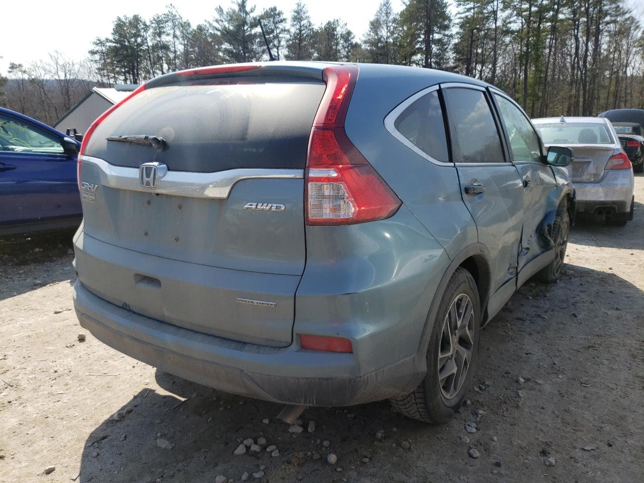 Photo 4 from auction – 2016 HONDA CR-V SE with VIN 5J6RM4H49GL050263