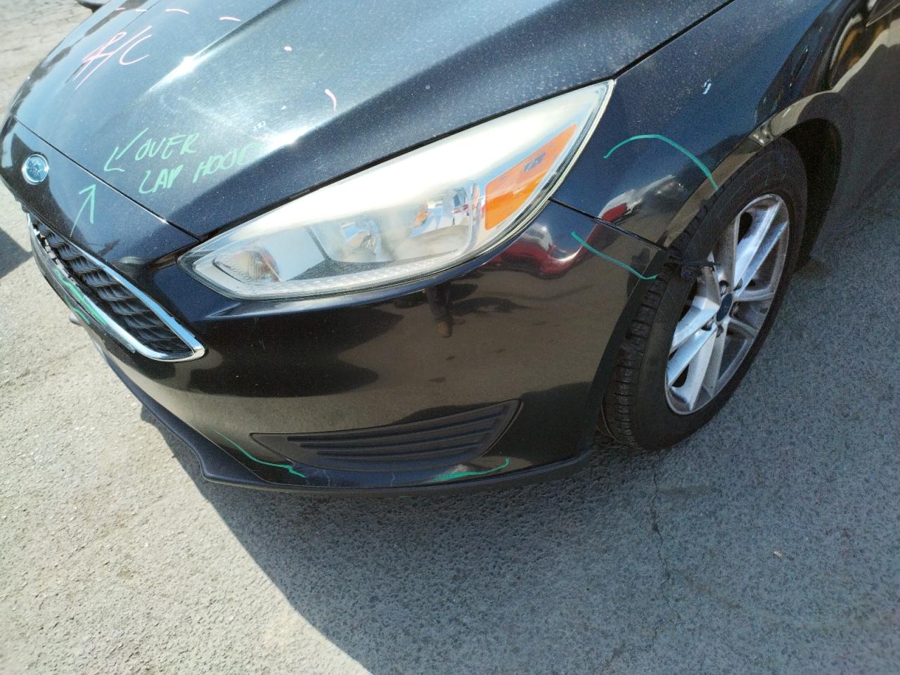 Photo 9 from auction – 2015 FORD FOCUS SE with VIN 1FADP3K22FL204681