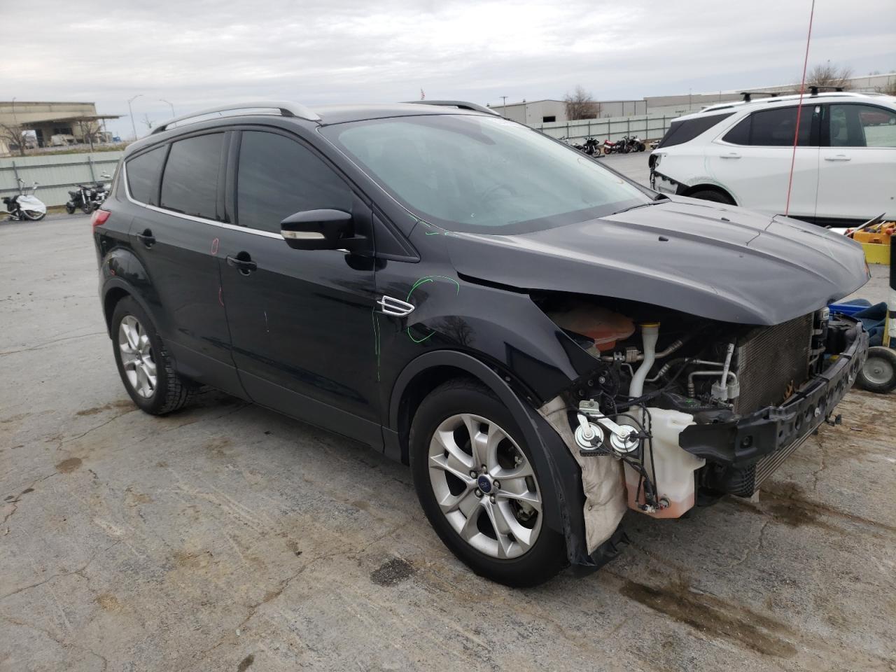 FORD ESCAPE TIT 2016 with VIN 1FMCU0J92GUA78051 - Photo from auction