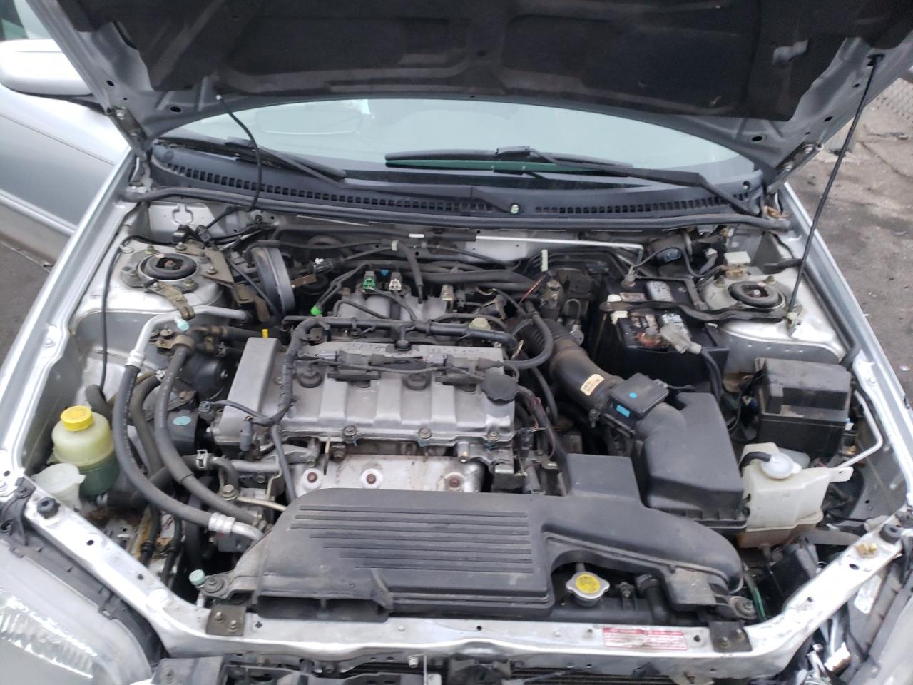 Photo 7 from auction – 2003 MAZDA PROTEGE with VIN JM1BJ225531166670