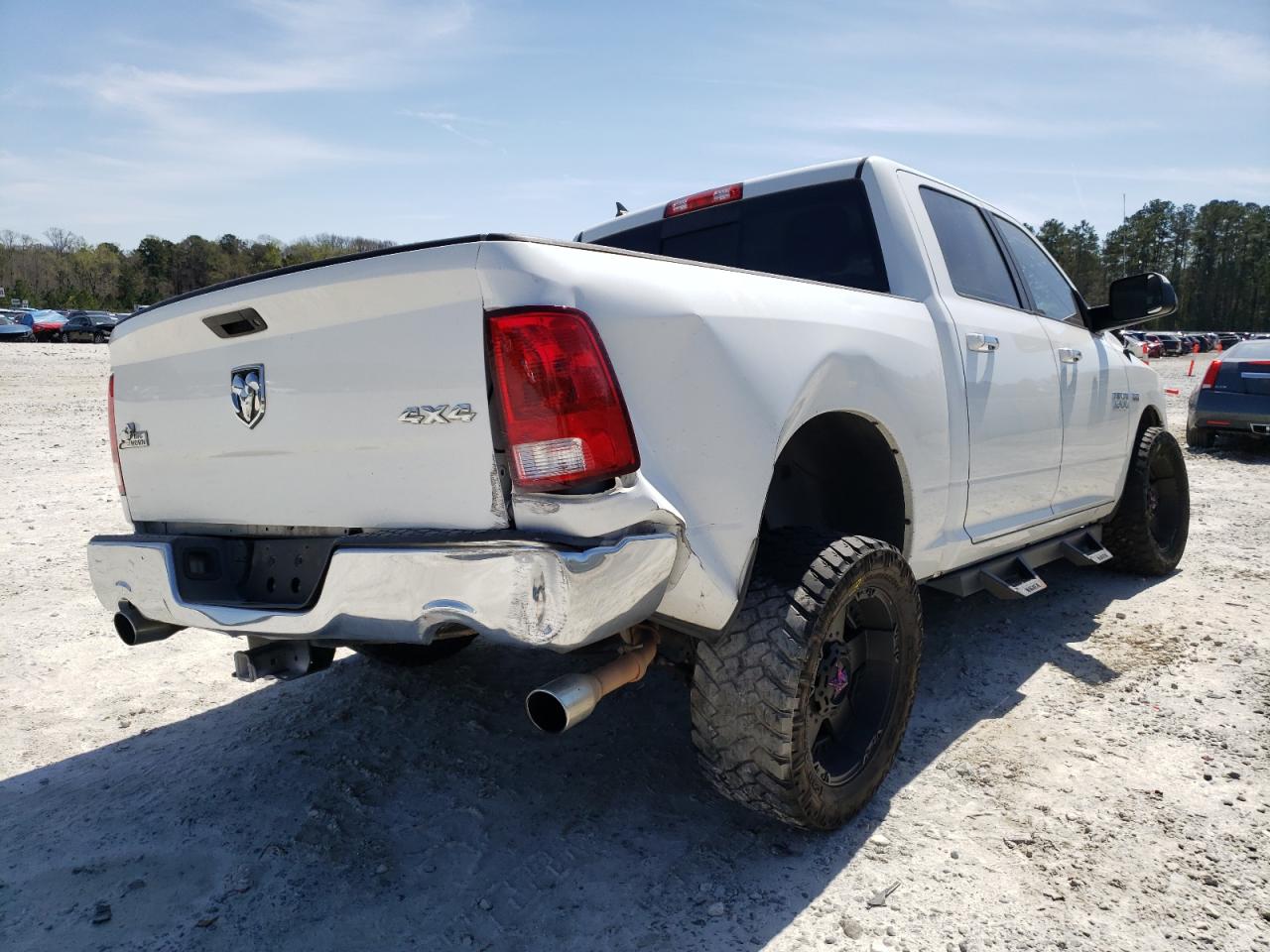Photo 4 from auction – 2014 RAM 1500 SLT with VIN 1C6RR7LT4ES309131