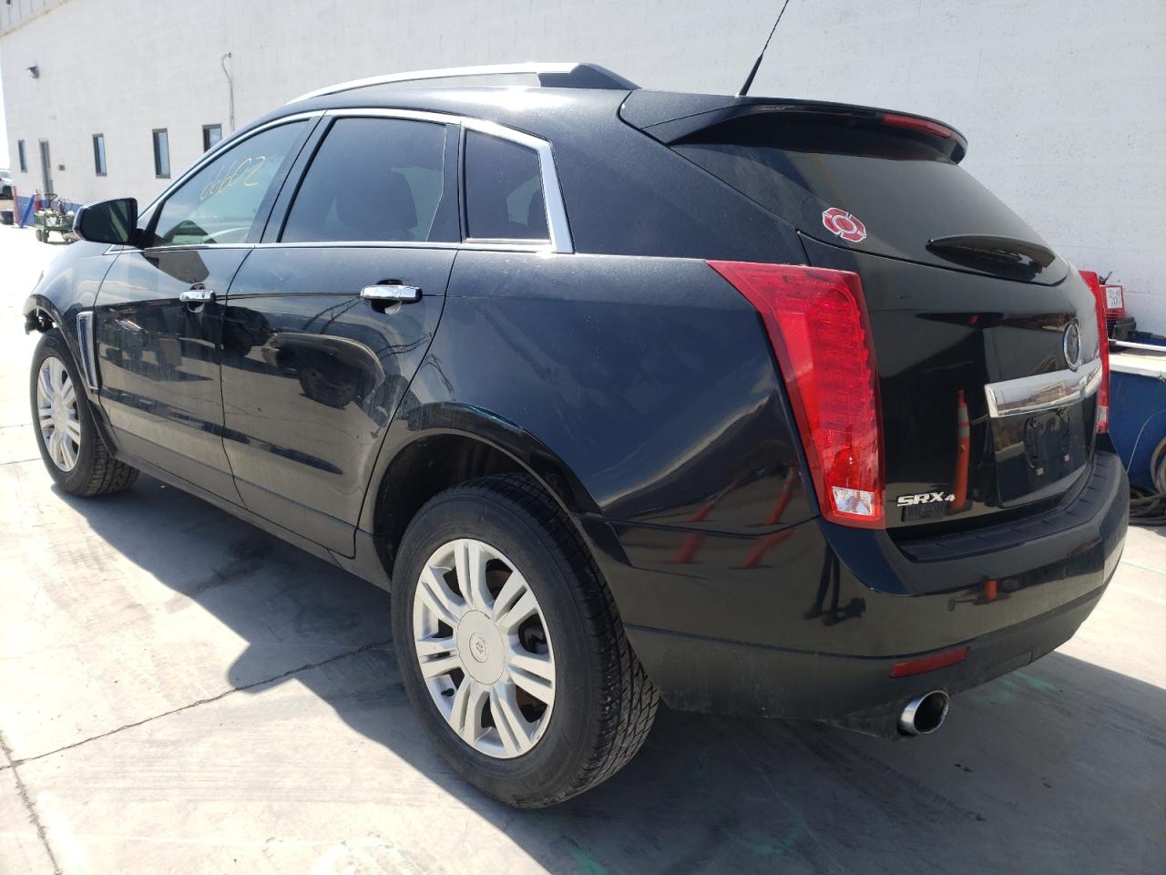 Photo 3 from auction – 2014 CADILLAC SRX LUXURY with VIN 3GYFNEE34ES650746