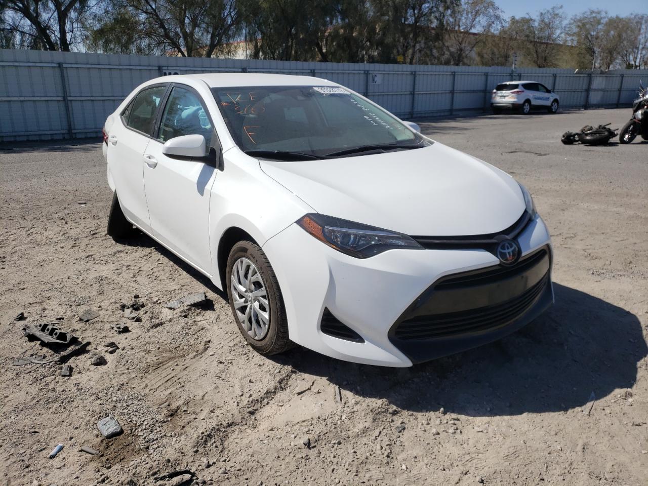 TOYOTA COROLLA L 2018 with VIN 5YFBURHE5JP814654 - Photo from auction