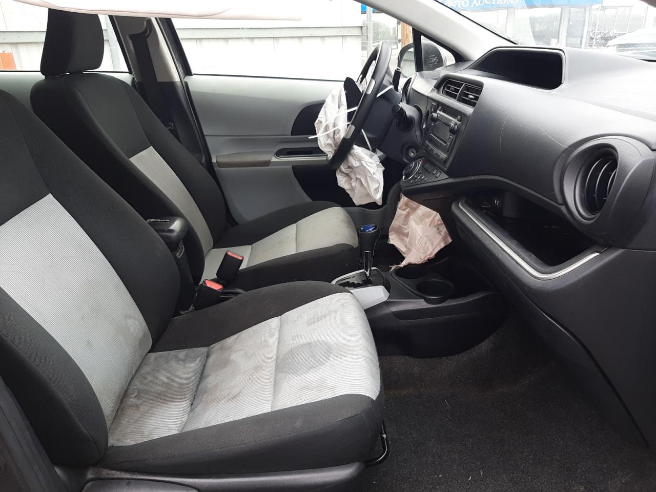 Photo 5 from auction – 2014 TOYOTA PRIUS C with VIN JTDKDTB38E1571064