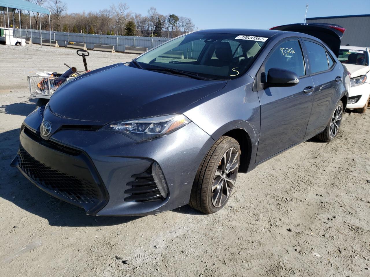Photo 2 from auction – 2017 TOYOTA COROLLA L with VIN 5YFBURHE5HP671411