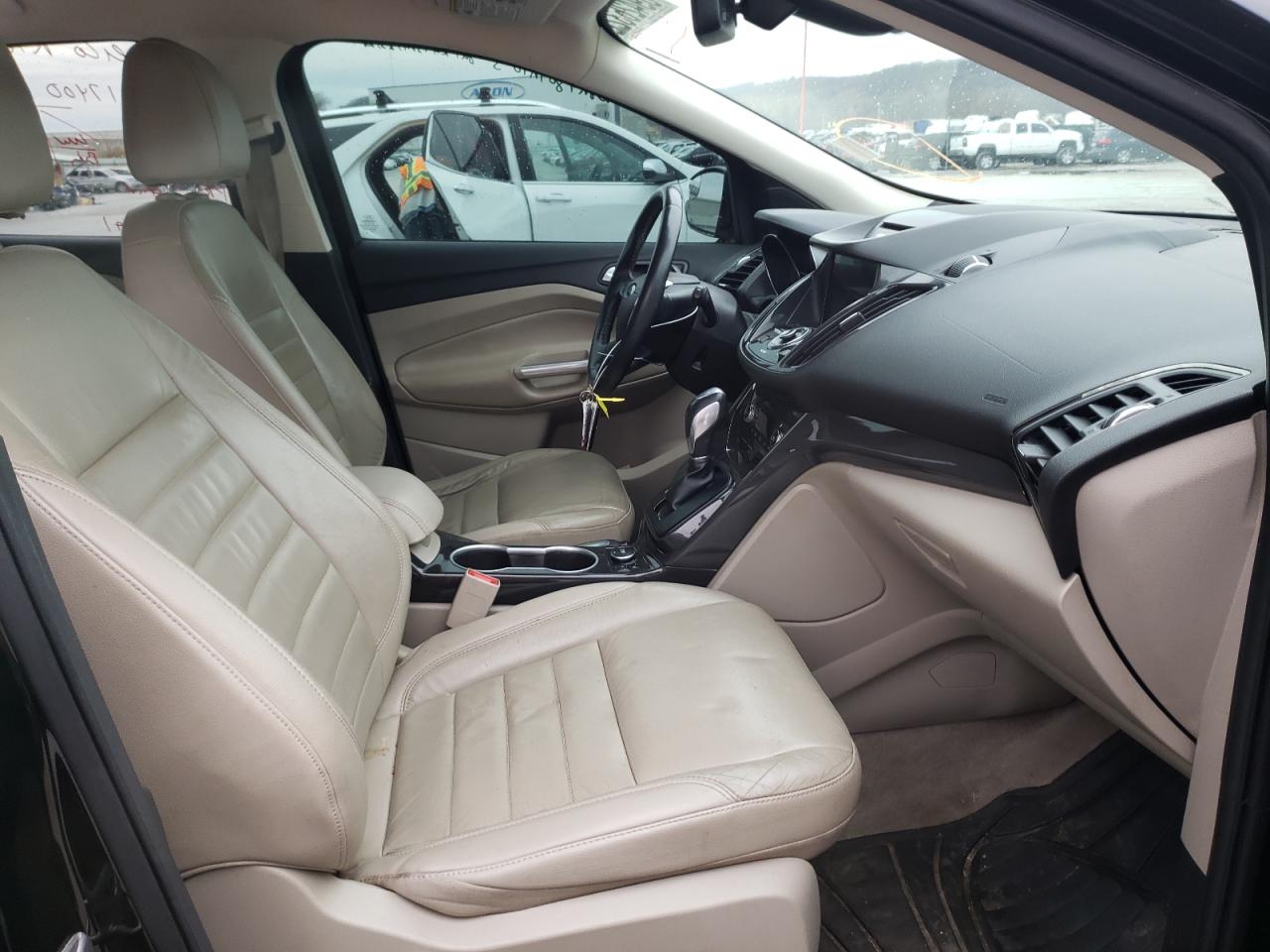 Photo 5 from auction – 2016 FORD ESCAPE TIT with VIN 1FMCU0J92GUA78051