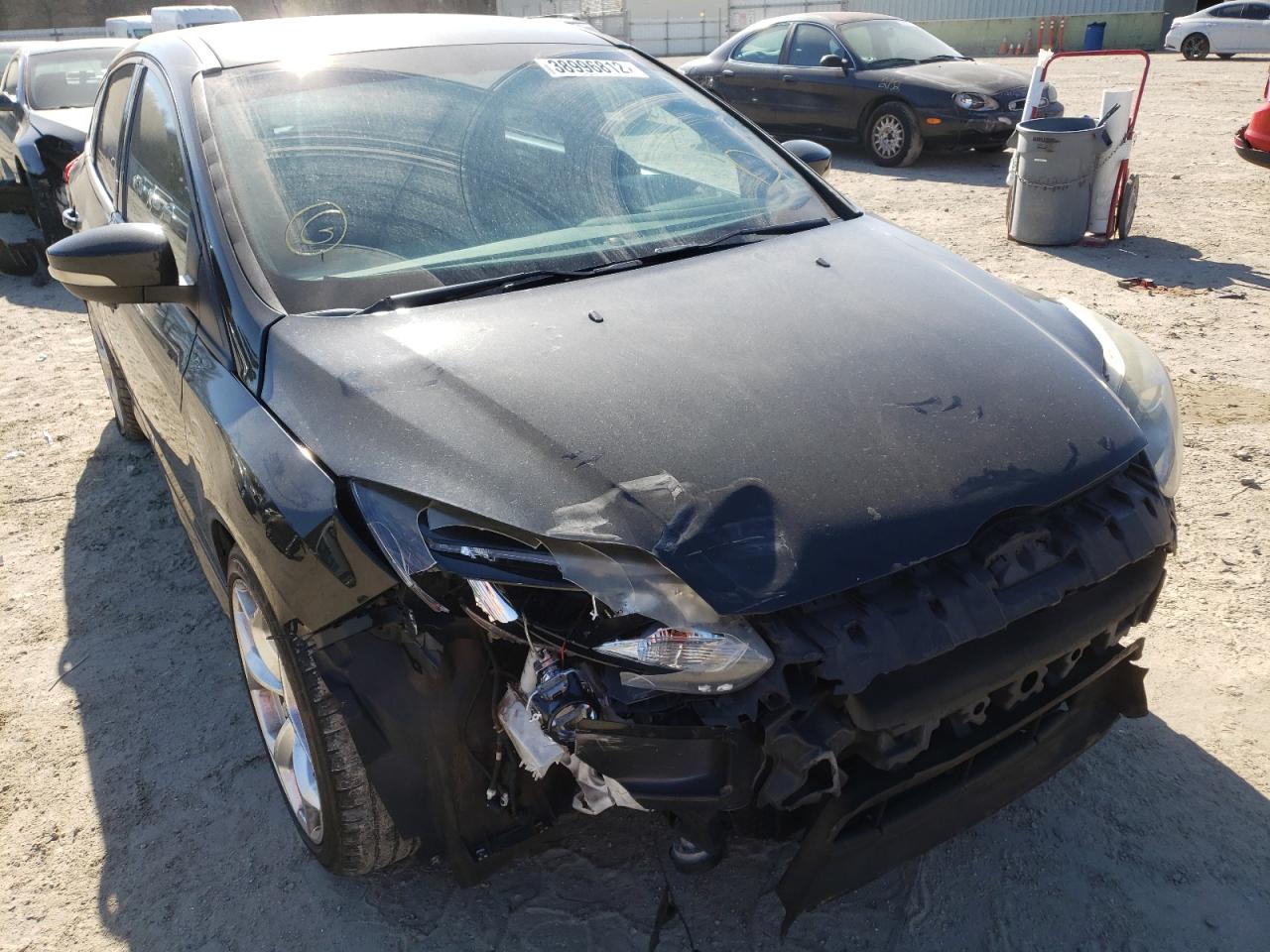 FORD FOCUS ST 2013 with VIN 1FADP3L98DL323277 - Photo from auction