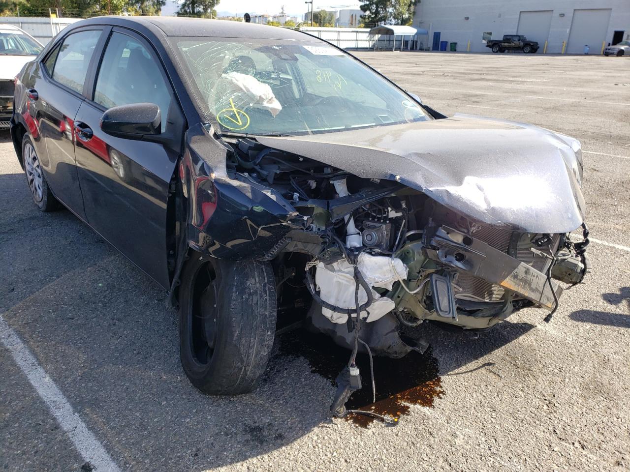 TOYOTA COROLLA LE 2018 with VIN 5YFBURHE1JP804526 - Photo from auction