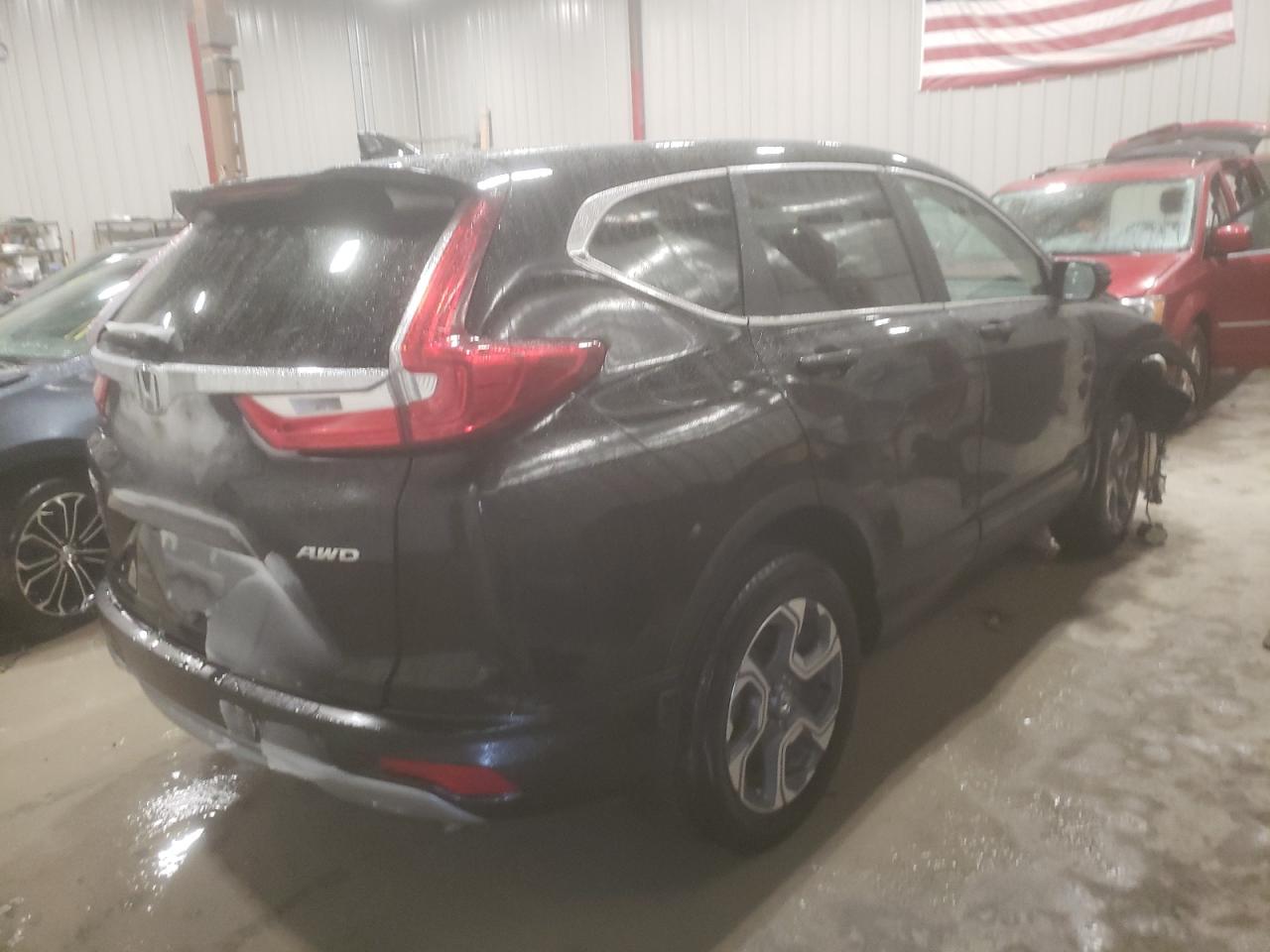 Photo 4 from auction – 2018 HONDA CR-V EXL with VIN 7FARW2H89JE082572