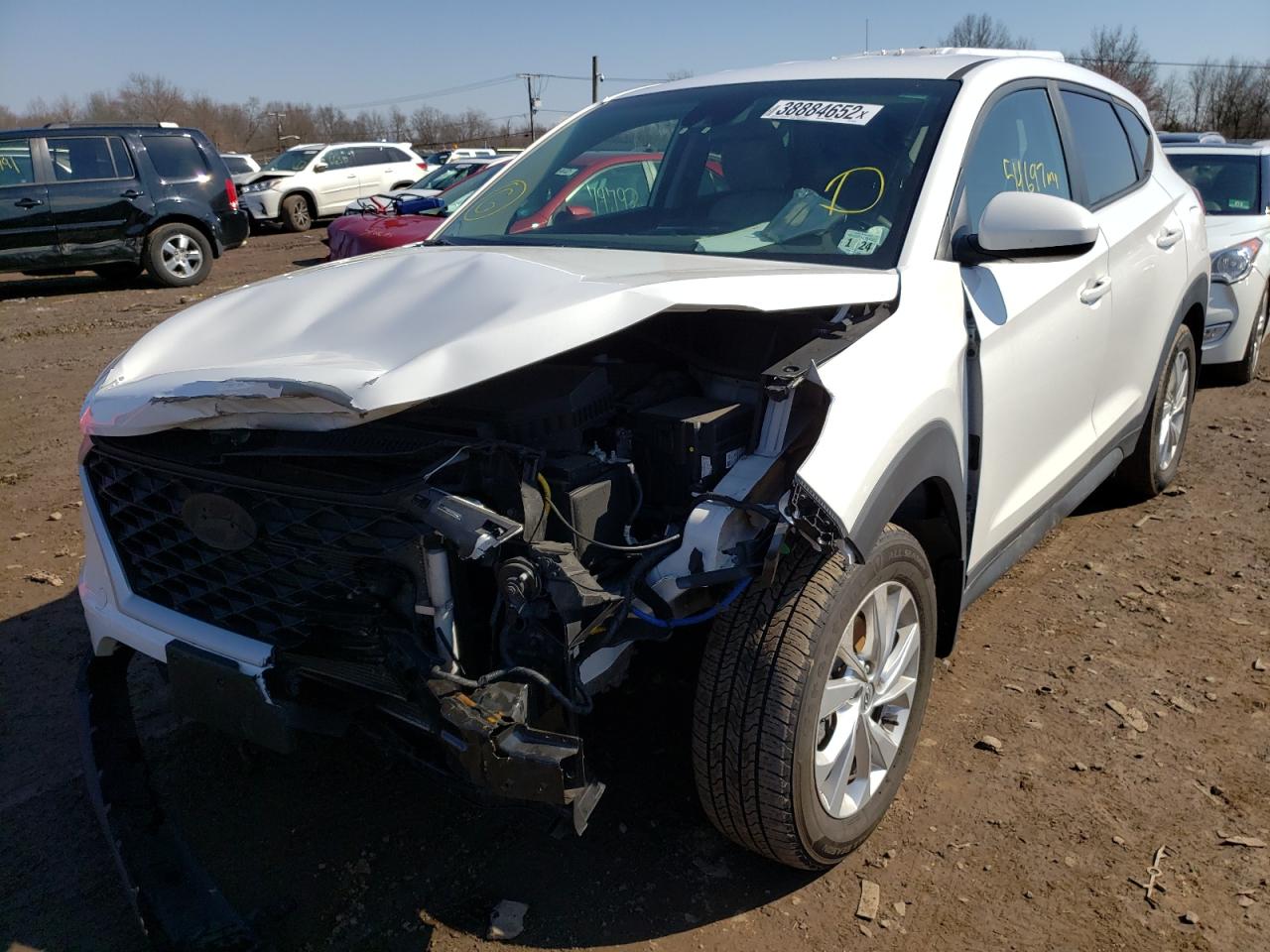 Photo 2 from auction – 2019 HYUNDAI TUCSON SE with VIN KM8J2CA42KU899145