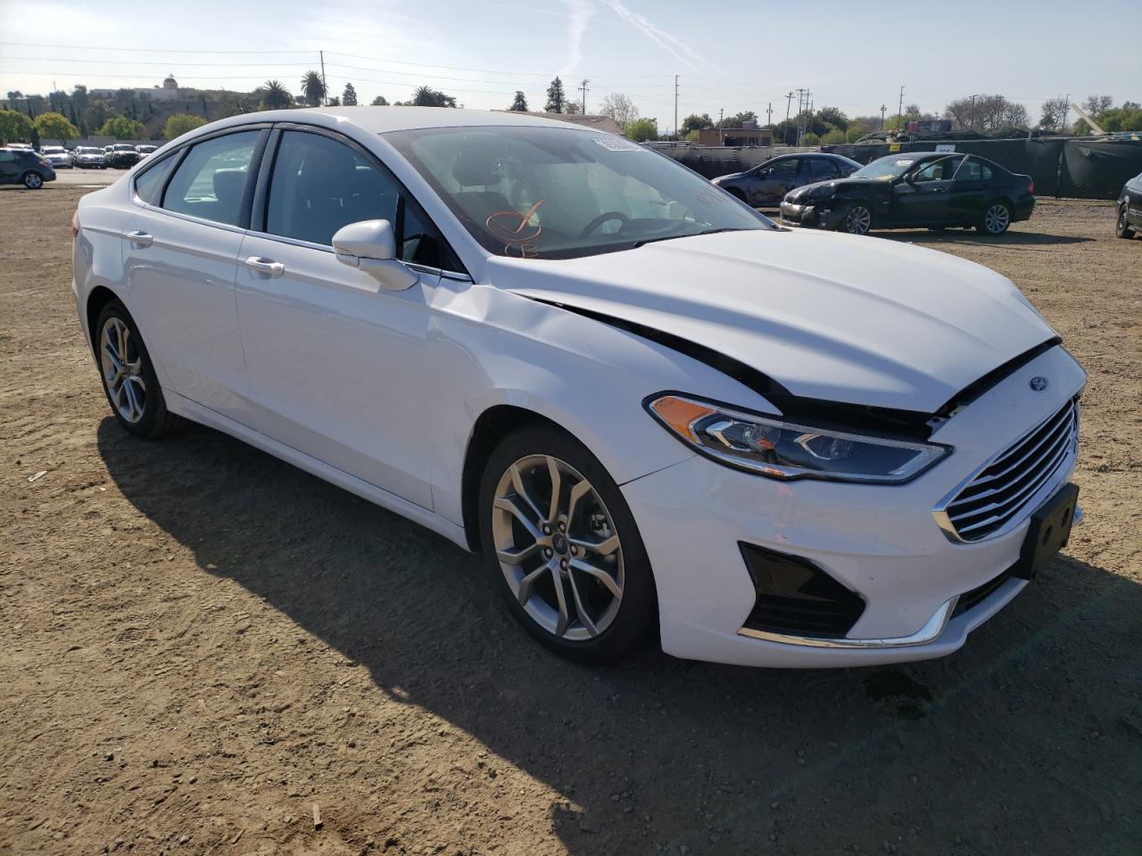 FORD FUSION SEL 2020 with VIN 3FA6P0CD0LR207695 - Photo from auction