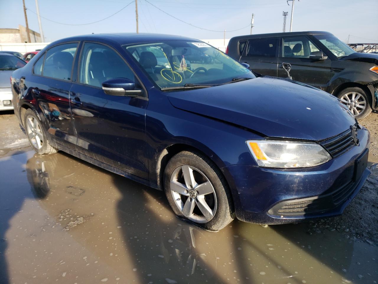 VOLKSWAGEN JETTA TDI 2011 with VIN 3VWLL7AJ5BM050958 - Photo from auction