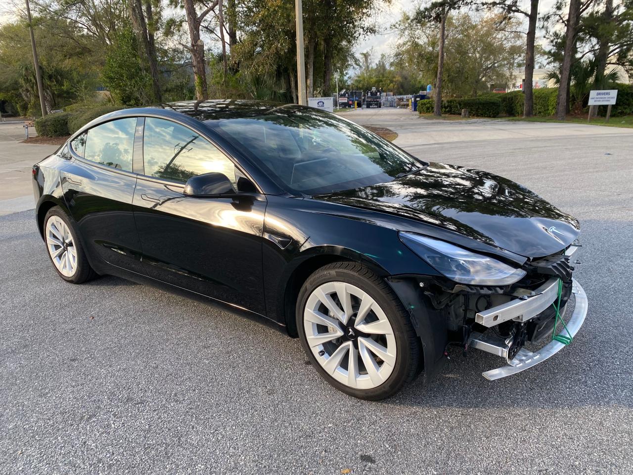 TESLA MODEL 3 2021 with VIN 5YJ3E1EB8MF989977 - Photo from auction