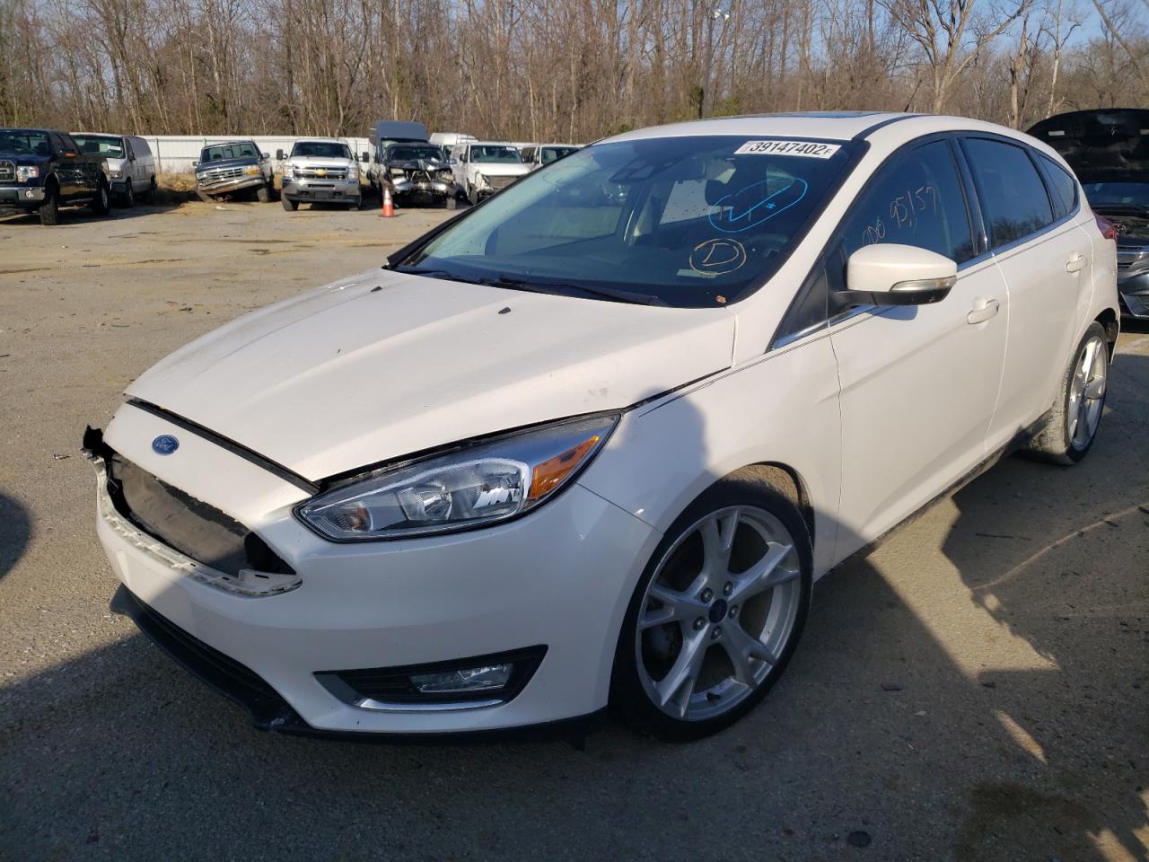 Photo 2 from auction – 2015 FORD FOCUS TITA with VIN 1FADP3N28FL340311