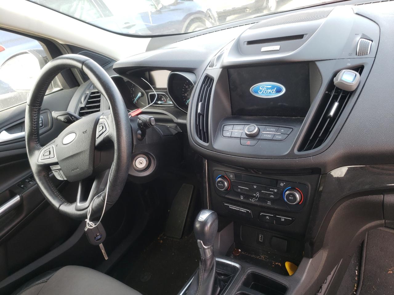 Photo 9 from auction – 2017 FORD ESCAPE SE with VIN 1FMCU9GD6HUC80795