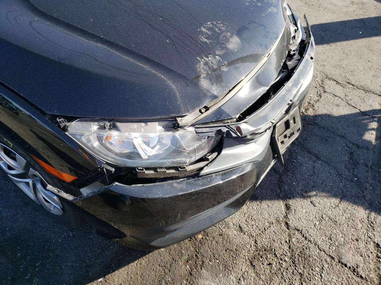 Photo 9 from auction – 2018 HONDA CIVIC LX with VIN 2HGFC2F5XJH523069