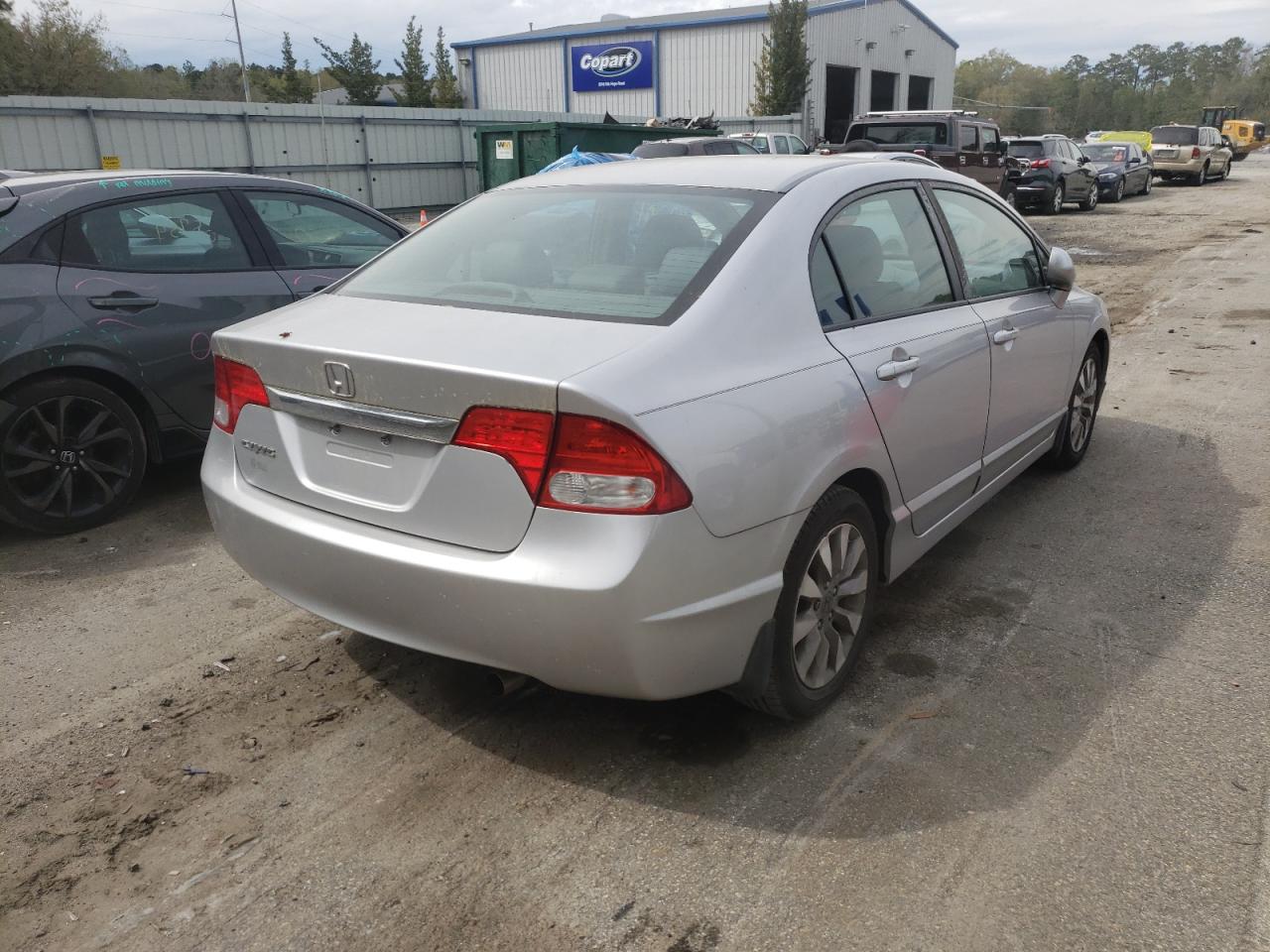 Photo 4 from auction – 2011 HONDA CIVIC EXL with VIN 19XFA1F93BE019106