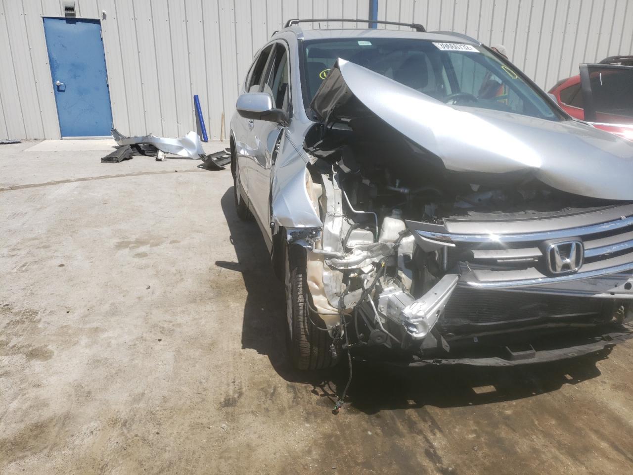 Photo 9 from auction – 2012 HONDA CR-V EXL with VIN 5J6RM3H71CL010273