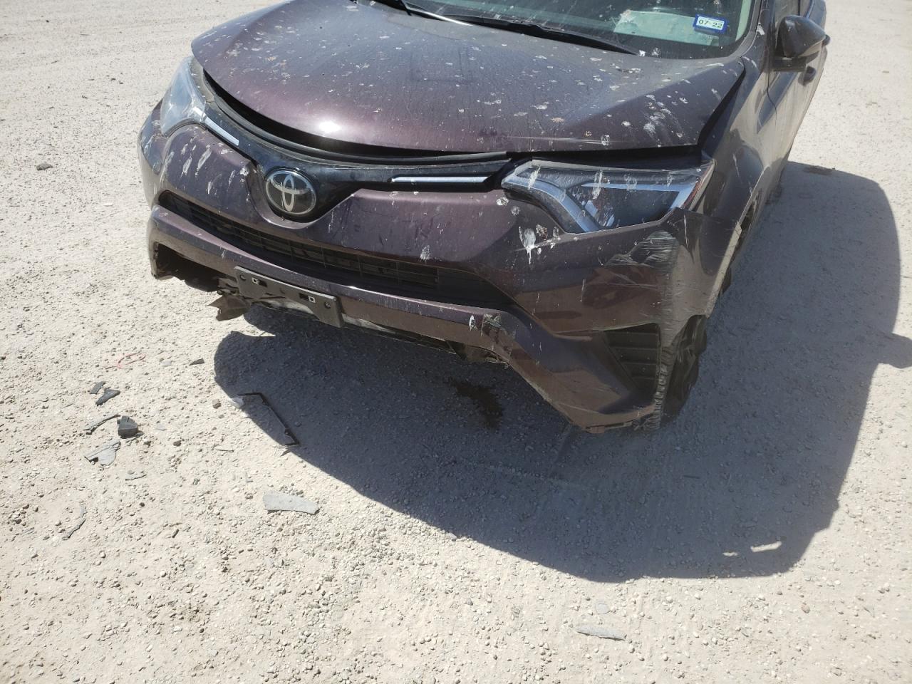 Photo 9 from auction – 2018 TOYOTA RAV4 LE with VIN 2T3ZFREV0JW498499
