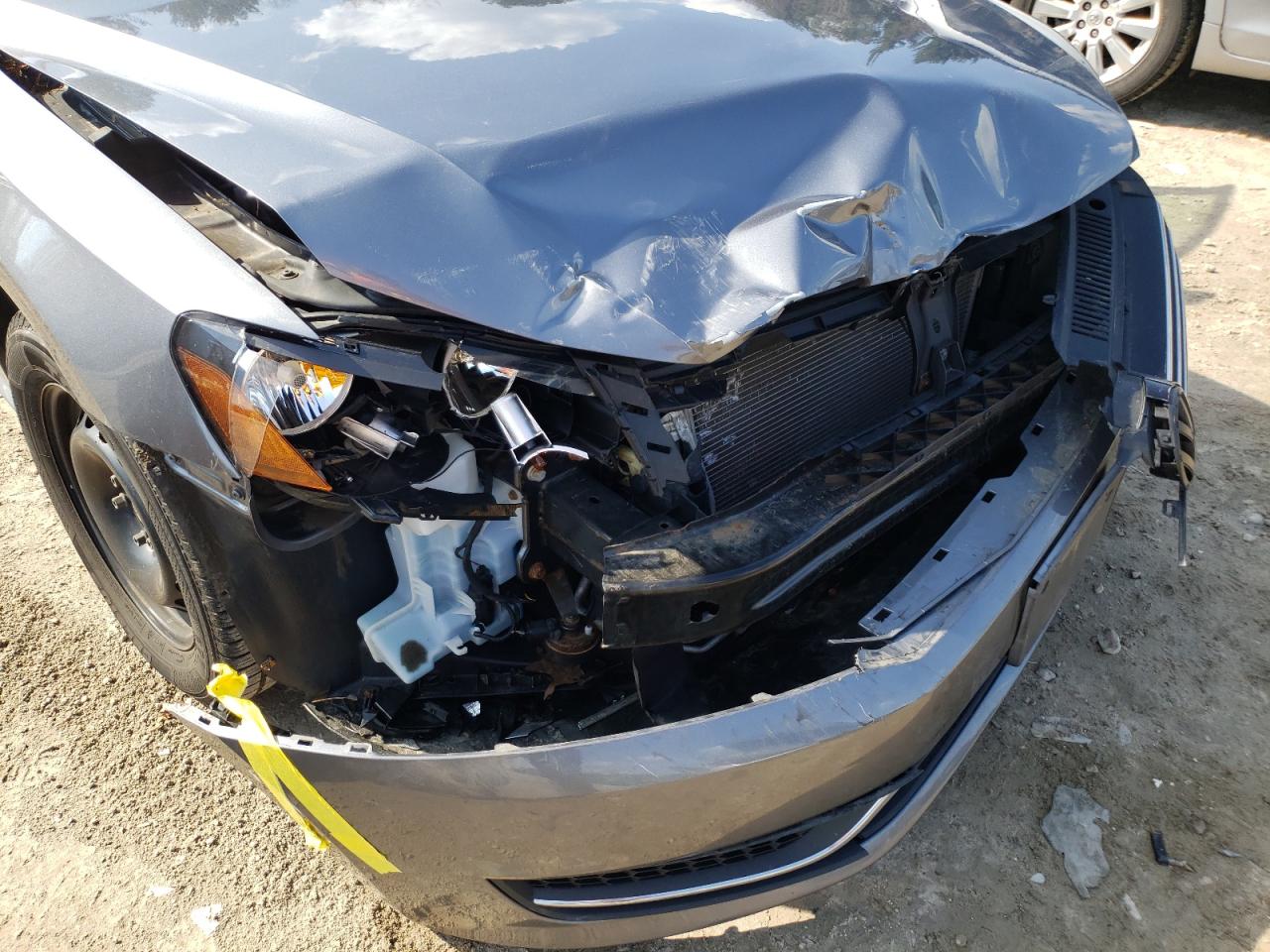 Photo 9 from auction – 2014 VOLKSWAGEN PASSAT S with VIN 1VWAT7A32EC022808