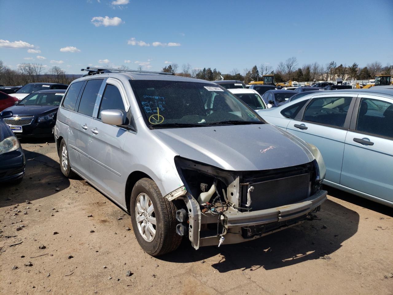 HONDA ODYSSEY EX 2010 with VIN 5FNRL3H70AB096698 - Photo from auction