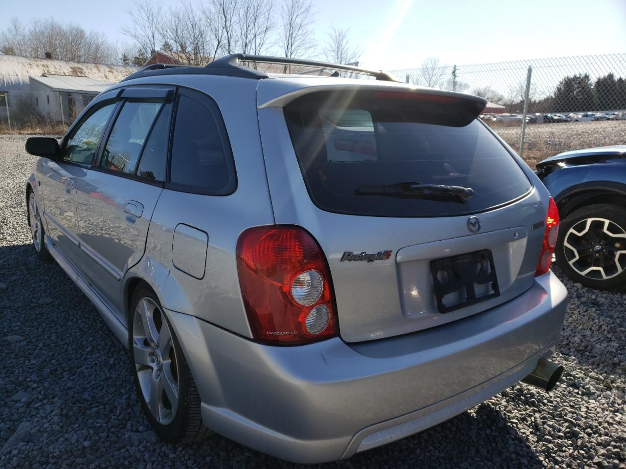 Photo 3 from auction – 2003 MAZDA PROTEGE PR with VIN JM1BJ245631107964