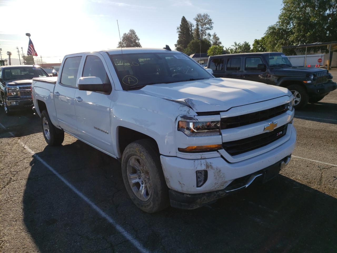 CHEVROLET SILVERADO 2018 with VIN 3GCUKREC8JG644507 - Photo from auction