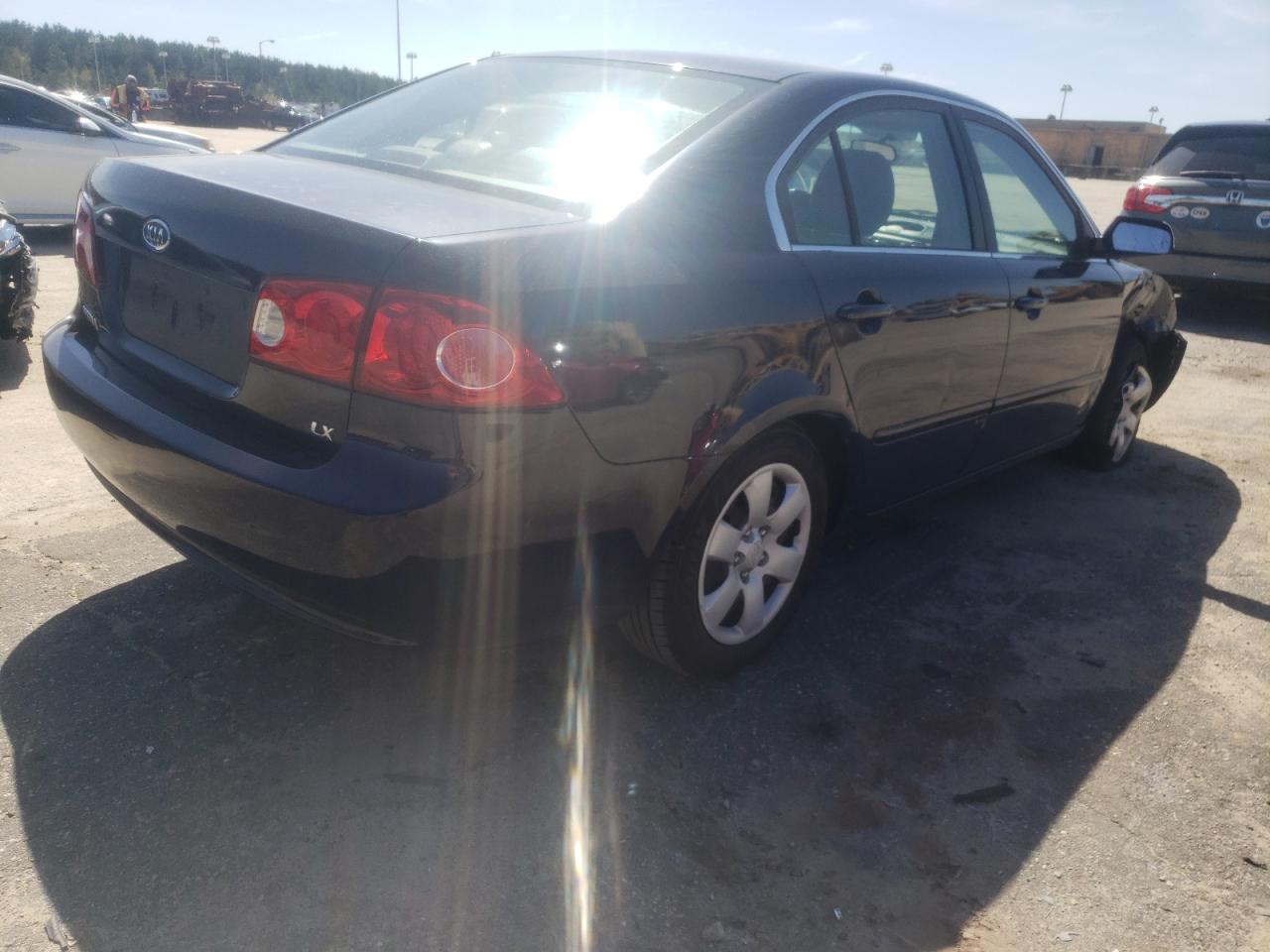 Photo 4 from auction – 2006 KIA OPTIMA LX with VIN KNAGE123765067247