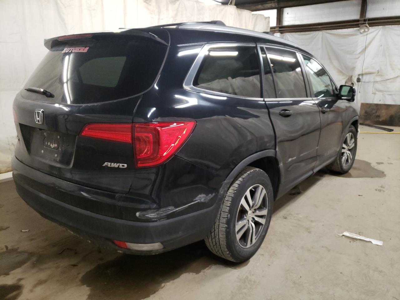 Photo 4 from auction – 2016 HONDA PILOT EXL with VIN 5FNYF6H50GB011614