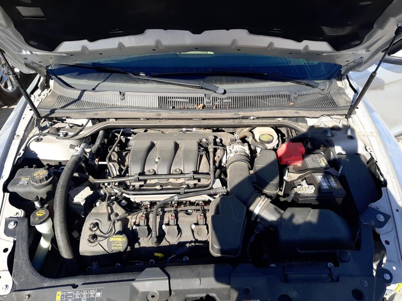 Photo 7 from auction – 2014 FORD TAURUS SEL with VIN 1FAHP2E89EG130579